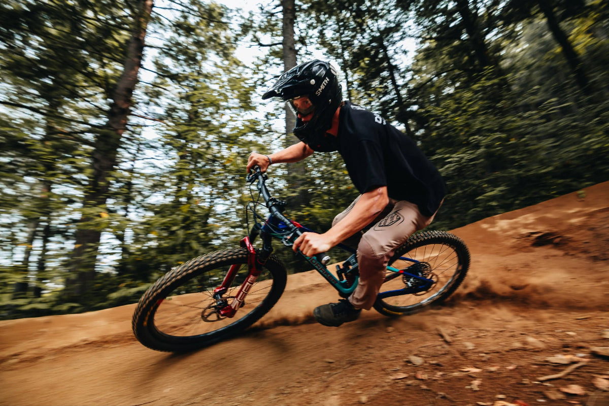 Mountain Biker Hitting Berm